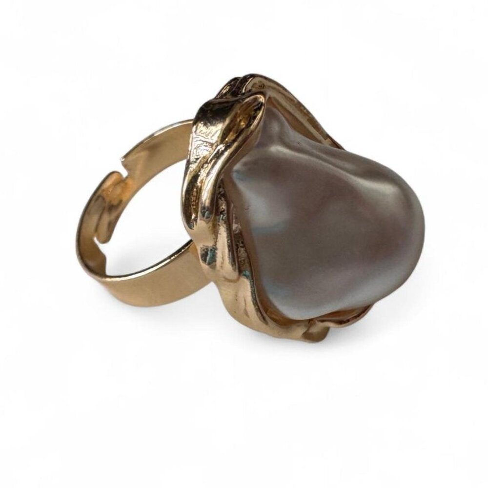 Size 7 adjustable Gold and faux pearl ring with a...